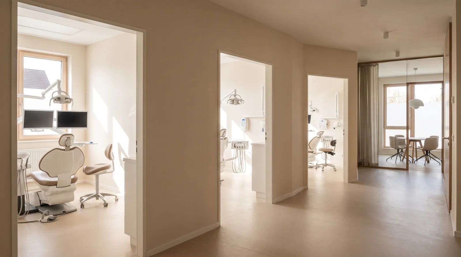 Corridor of a multi-specialty dental office with several equipped treatment rooms under one roof